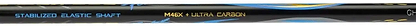 Close-up of the Li-Ning BladeX 800 Speed Badminton Racket - Storm Blue shaft, featuring blue, yellow, and gray accents. The text shows "STABILIZED ELASTIC SHAFT" in blue and "MAXI / ULTRA CARBON" in yellow on this head-light racket.