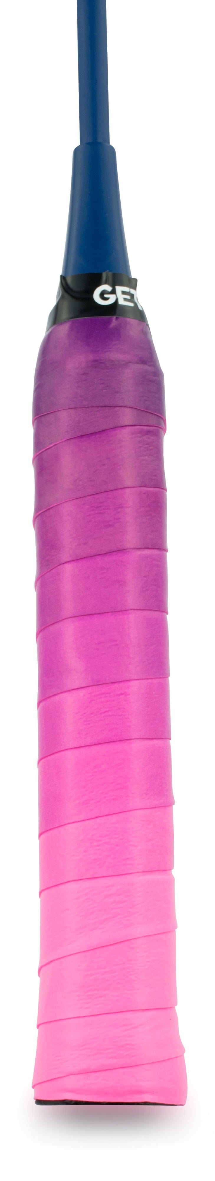 A cricket bat handle wrapped in the Get A Grip Badminton Overgrip - Cascade by Get A Grip, featuring a dark-to-light pink gradient for enhanced moisture absorption, leaves a blue bat handle exposed above the grip.