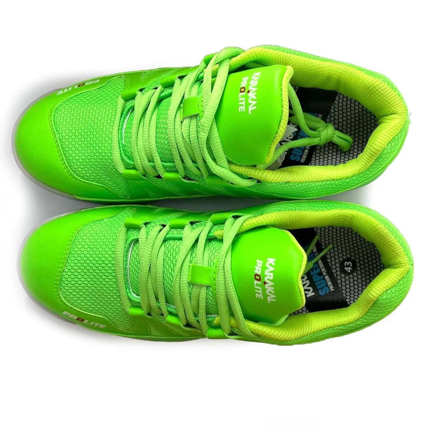 A pair of Karakal KF Pro Lite Badminton Shoes in vibrant green, featuring matching laces and the brand name "Karakal" on the tongue. Engineered for lateral stability, these shoes have a green interior lining and are showcased side by side against a white background.