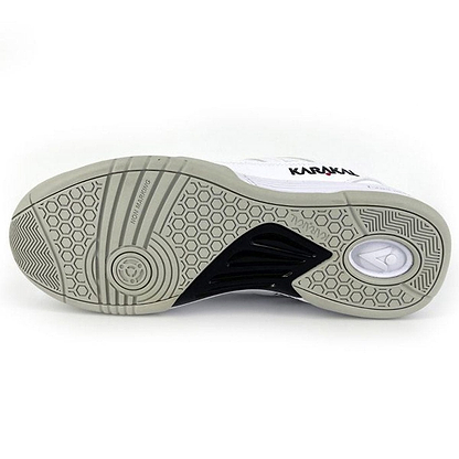 The Karakal KF Pro Lite Badminton Shoes from Karakal feature a multi-textured sole with hexagonal patterns and a circular grip area to enhance lateral stability. These stylish shoes come in a sleek combination of light grey, black, and white, and include a shock-absorbing gel insole for maximum comfort.