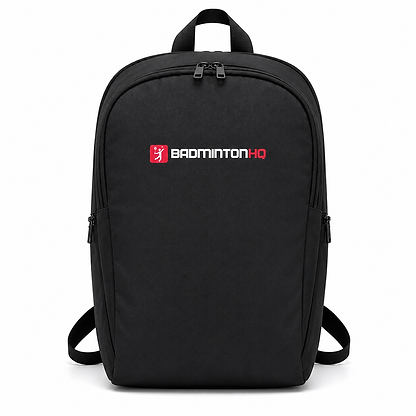 The BadmintonHQ Badminton Backpack - Black features two zippered compartments, adjustable shoulder straps, a top handle, and the white/red BadmintonHQ logo on the front. Perfect for carrying your badminton kit. Background is plain white.