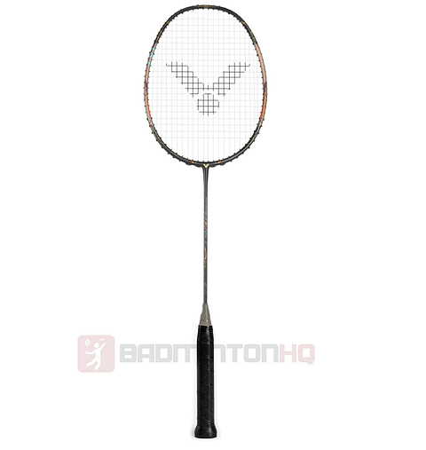 The Victor Thruster F Ultra Badminton Racket - Moonless Night by Victor boasts a black handle and an orange and black frame, presented vertically. Its strings are tightly woven, showcasing a logo pattern at the center, ideal for executing fast, controlled attacks. A logo and "BADMINTONHQ" can be seen at the bottom.
