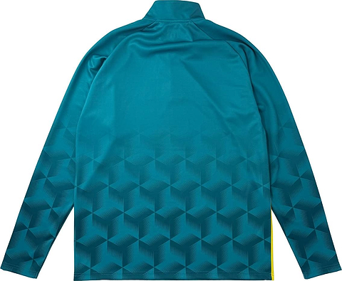 The Yonex YML7 Unisex Badminton Midlayer in teal is a long-sleeve athletic jacket, shown from the back, with a geometric cube pattern on the lower half that gradually fades upward. Inspired by Yonex team apparel, this design features no visible logos or text.