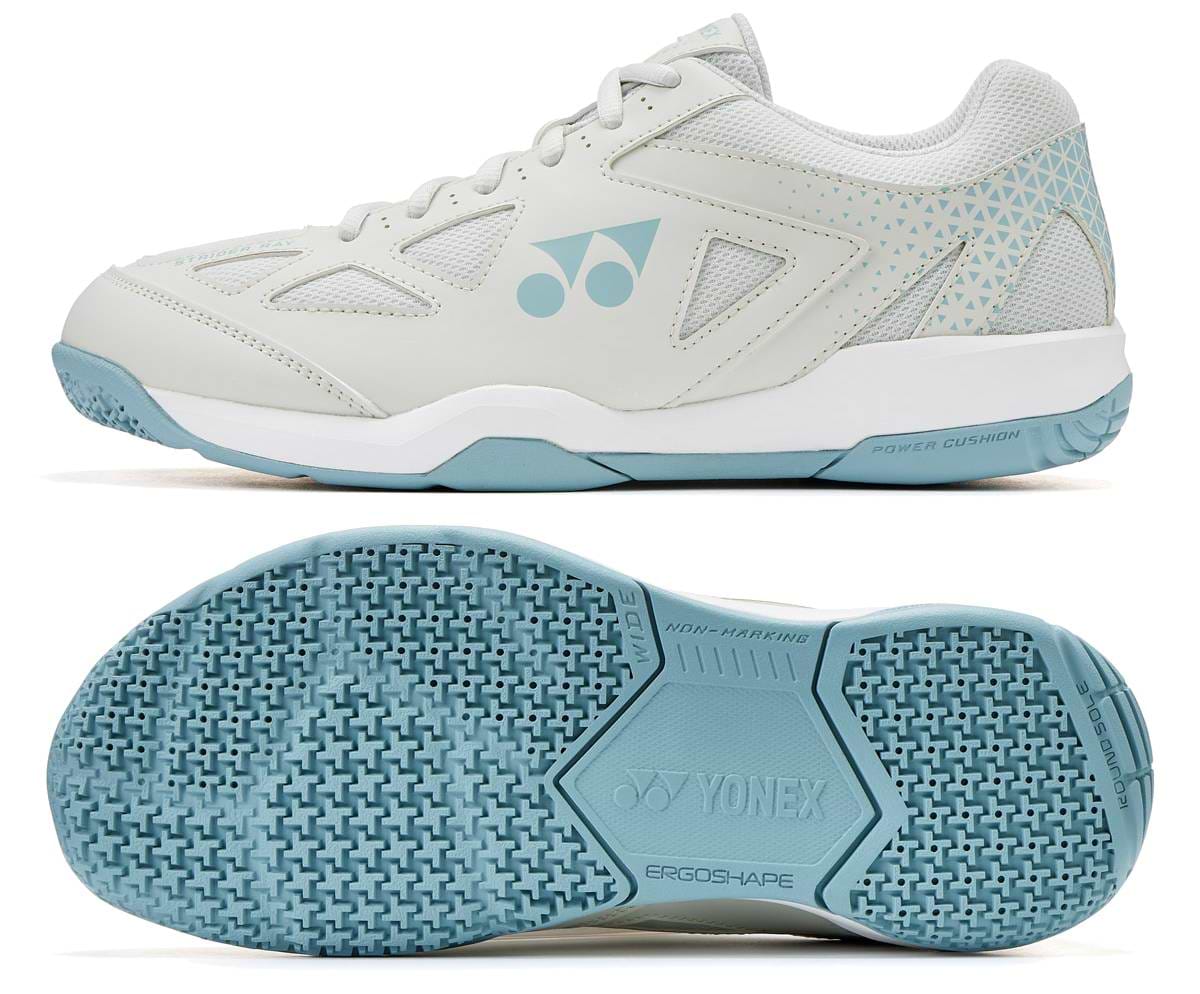 A close-up of the Yonex Power Cushion Strider Ray Unisex WIDE Badminton Shoes in Blue Grey, crafted with a wide fit for enhanced comfort and support.
