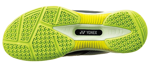 The image displays the sole of the Yonex Power Cushion 88 Dial 3 Unisex Badminton Shoes in Deep Green, featuring a yellow and green textured grip pattern with the Yonex logo at the center. This model utilizes the advanced BOA Fit System to provide a secure, customized fit ideal for high-speed badminton play.