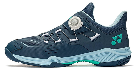 A navy and white Yonex Power Cushion 88 Dial 3 Wide unisex badminton shoe featuring the BOA Fit System’s white tightening dial, teal accents, a mesh upper, geometric Yonex logo on the side, and a light blue sole—specially designed as a wide-fit athletic model.