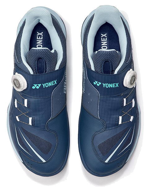 A pair of Yonex Power Cushion 88 Dial 3 Wide Unisex Badminton Shoes in navy and white, shown from above, featuring white BOA Fit System adjustment dials on the sides and “YONEX” branding on the tongues and straps. Designed for a wide fit, these shoes incorporate advanced Power Cushion 88 Dial technology for improved comfort and performance.