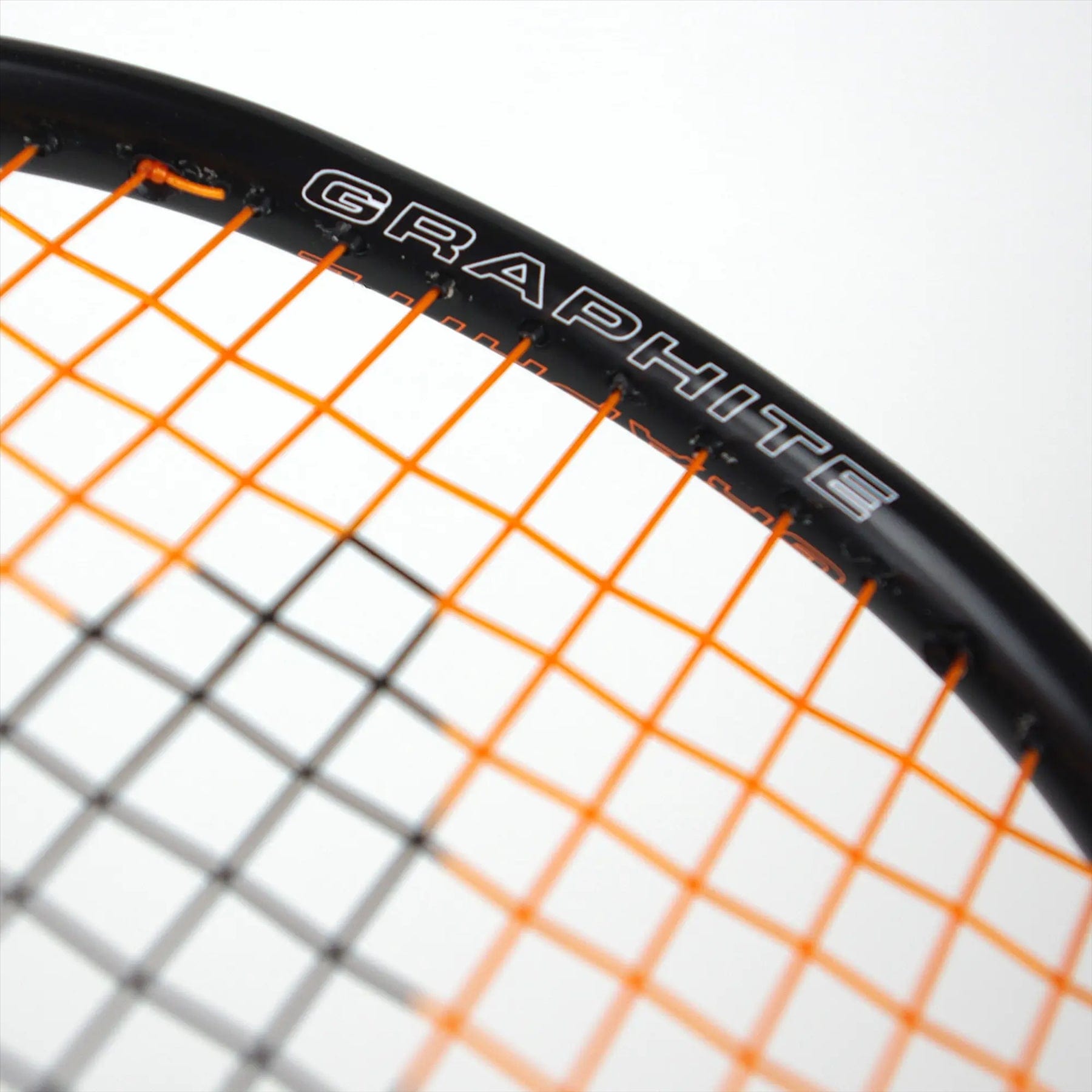 Close-up of a Karakal Black Zone BZ 30 2.1 badminton racket with an isometric head; features a black frame, vivid orange strings, and "GRAPHITE" printed boldly on the frame. It mirrors the precise design of a Karakal BZ 30 against a plain white background.