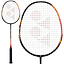 The Yonex Astrox E13 badminton racket features a stylish black handle paired with a bright red and yellow isometric head design, with the Yonex logo prominently displayed on the strings to boost performance.