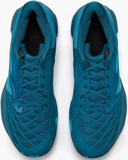 A top view of Yonex Power Cushion Cascade Drive 3 Unisex Badminton Shoes in Peacock Blue, featuring black interiors, teal laces, and a crisscross pattern on the toe for both style and support.