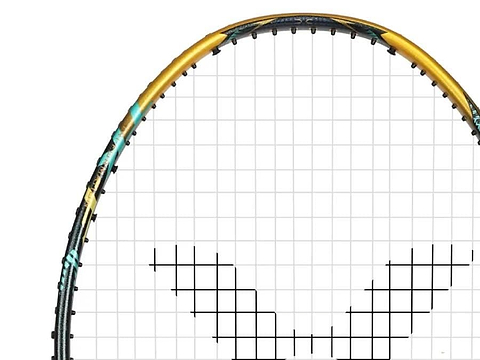 Close-up of the top half of the Victor Thruster F C Ultra X Badminton Racket by Victor, showcasing its gold and black frame with white strings and a head heavy balance, set against a plain white background.
