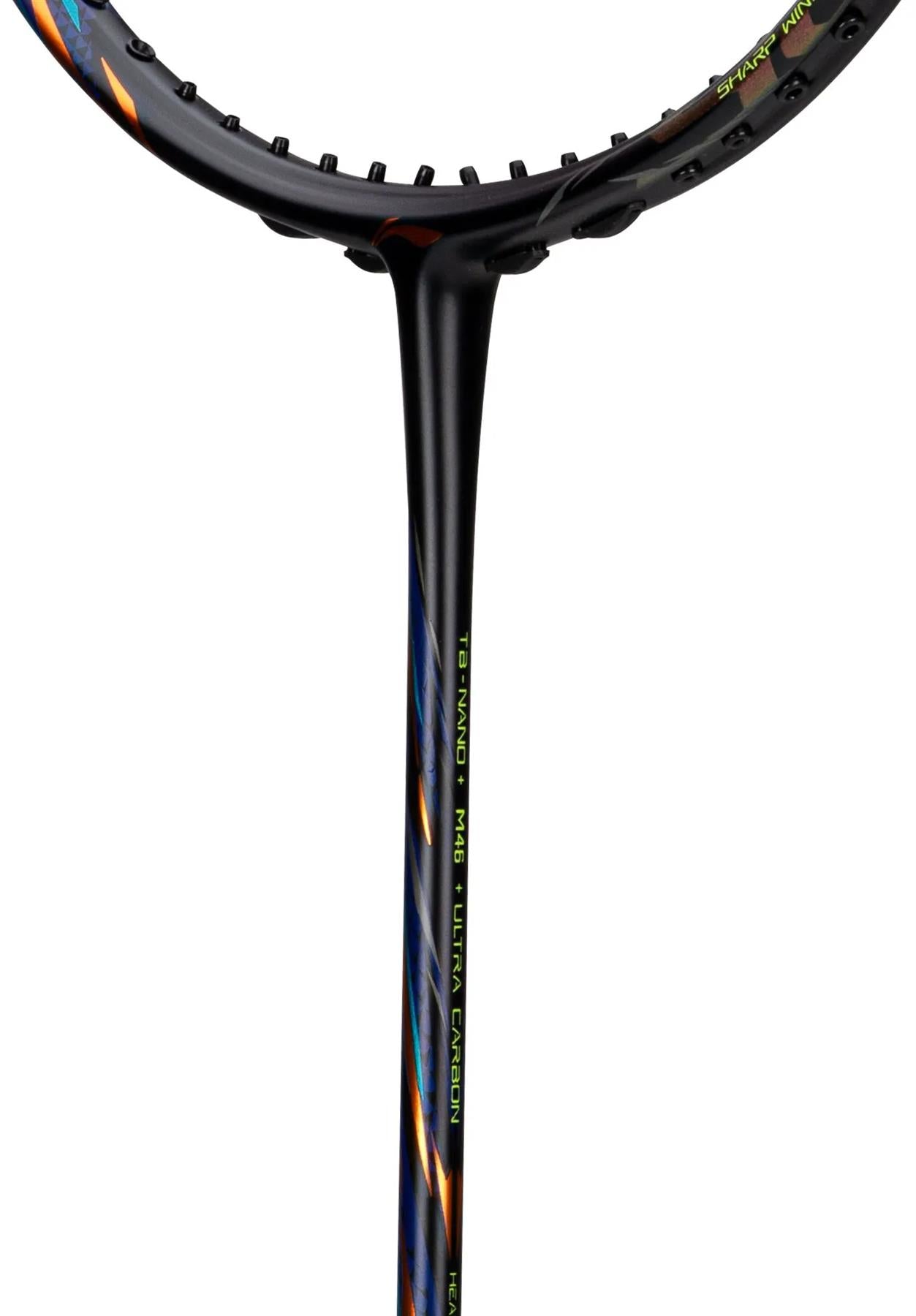 Close-up of the Li-Ning BladeX 900 3U Badminton Racket in Fluorescent Pink, showing the black frame with colorful accents and yellow "18 Nano PM45 Ultra Carbon" text. TB NANO technology featured; racket strings partially visible at the top.