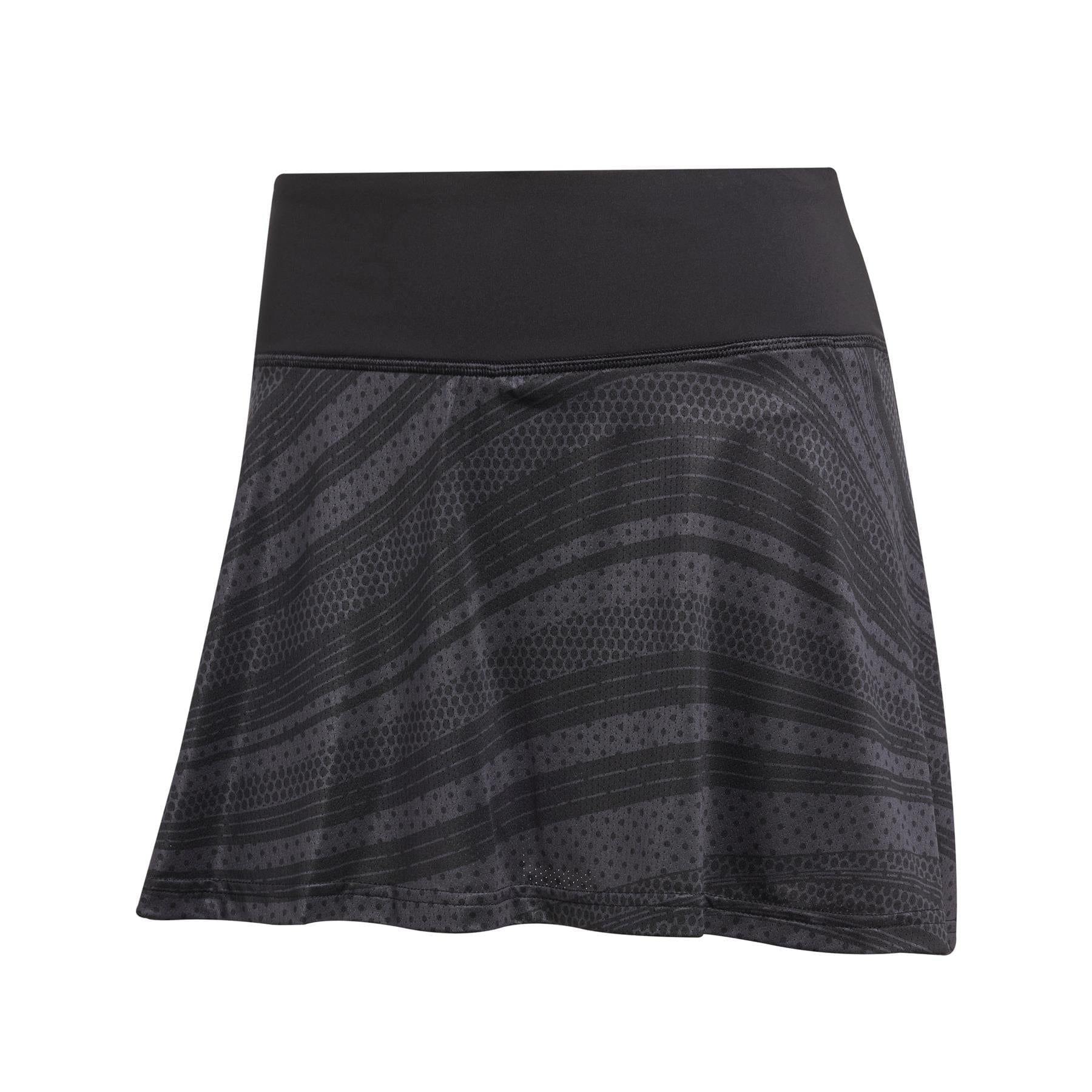 The ADIDAS Womens Club Graphic Badminton Skirt - Black by adidas is a sporty black skirt with a wide waistband and subtle stripes, crafted from lightweight recycled materials. Featuring dotted textures and a slightly flared hem, it’s perfect for sports or casual wear with CLIMACOOL technology for comfort.