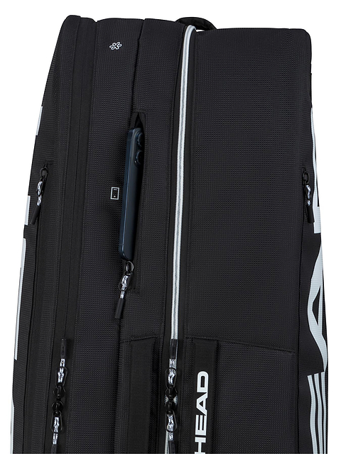 A close-up of the HEAD Tour 9 Racket Badminton Bag L - Black by HEAD shows multiple zippered compartments, white accents and branding, CCT+ climate control, and a partially open pocket revealing a smartphone.