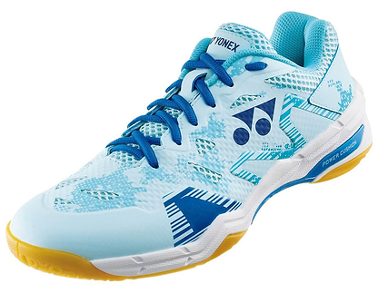 The Yonex Power Cushion Eclipsion X3 Unisex Badminton Shoes in light blue feature blue laces, a white sole, yellow outsole, and signature Yonex logos on the side and tongue. Perfect for indoor courts with "POWER CUSHION" marking on the sole.