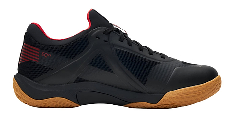 Introducing the Kanso Equilibrium EQx3 Unisex Badminton Shoes: black athletic footwear with a mesh and leather upper, red accents, a red interior, and a tan textured sole. Featuring Speedlight foam for superior comfort, they have a low-top silhouette with distinct EQ branding.