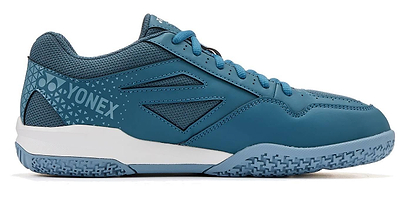 The Yonex Power Cushion Strider Ray Badminton Shoes in teal blue feature a textured sole, white midsole, and geometric heel pattern for superior shock absorption—perfect for badminton. Shown in a side view.