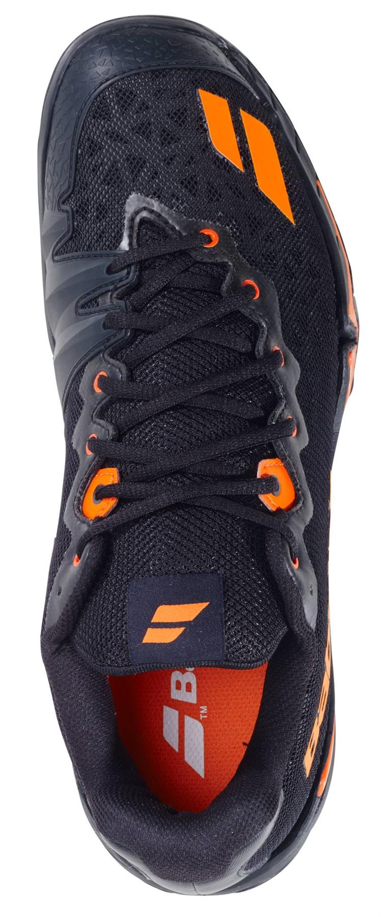 The Babolat Shadow 4 Men's Badminton Shoes in Black/Orange feature a black athletic design with orange details, black laces, and a textured upper for superior court performance.
