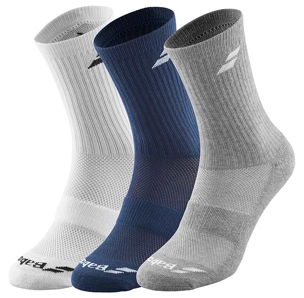 Side by side are three pairs of the Babolat Long 3 Pack Badminton Socks in white, blue, and gray. Each pair showcases ribbed cuffs and a subtle logo near the top. The white and gray socks include ventilated zones for enhanced comfort and support, featuring additional logos near the toes.