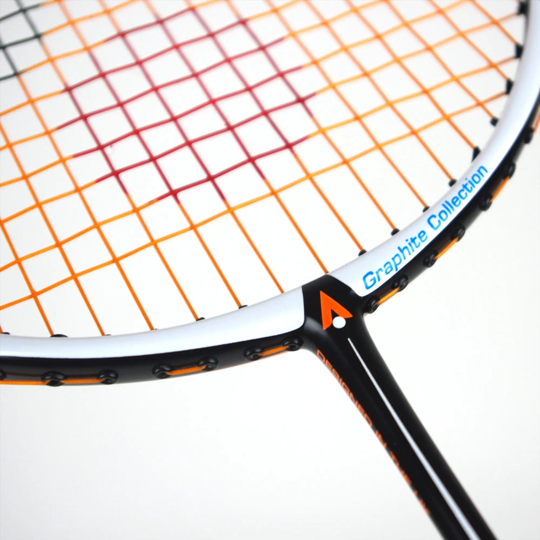 Close-up of a Karakal Black Zone BZ 30 2.1 badminton racket head with an isometric design and colorful strings in red, yellow, orange, and black. The sleek frame is in white and black with "Graphite Collection" text on a plain white background.