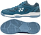 The Yonex Power Cushion Strider Ray Unisex Badminton Shoes in Teal Blue feature a geometric heel, visible Yonex logos, textured outsole grip, white cushioned sole, and Power Cushion technology for superior shock absorption.