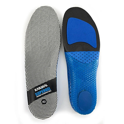 Two insoles from the Karakal KF Pro Lite Badminton Shoes are shown. One displays the top side with a gray, textured surface and the Karakal brand details. The other exhibits the underside, which features blue padding with a black heel area highlighting its cushioning, support, and advanced shock-absorbing gel insole technology for enhanced comfort.