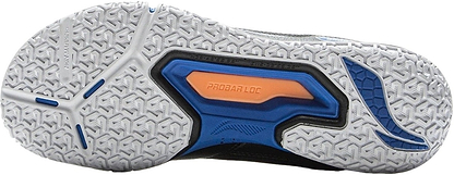 Close-up of the Li-Ning Saga III Lite Mens Badminton Shoes - Black outsole, showing a textured white tread, blue and black accents, and an orange "PROBAR LOC" section—plus advanced Li-Ning Cloud cushioning for superior comfort.