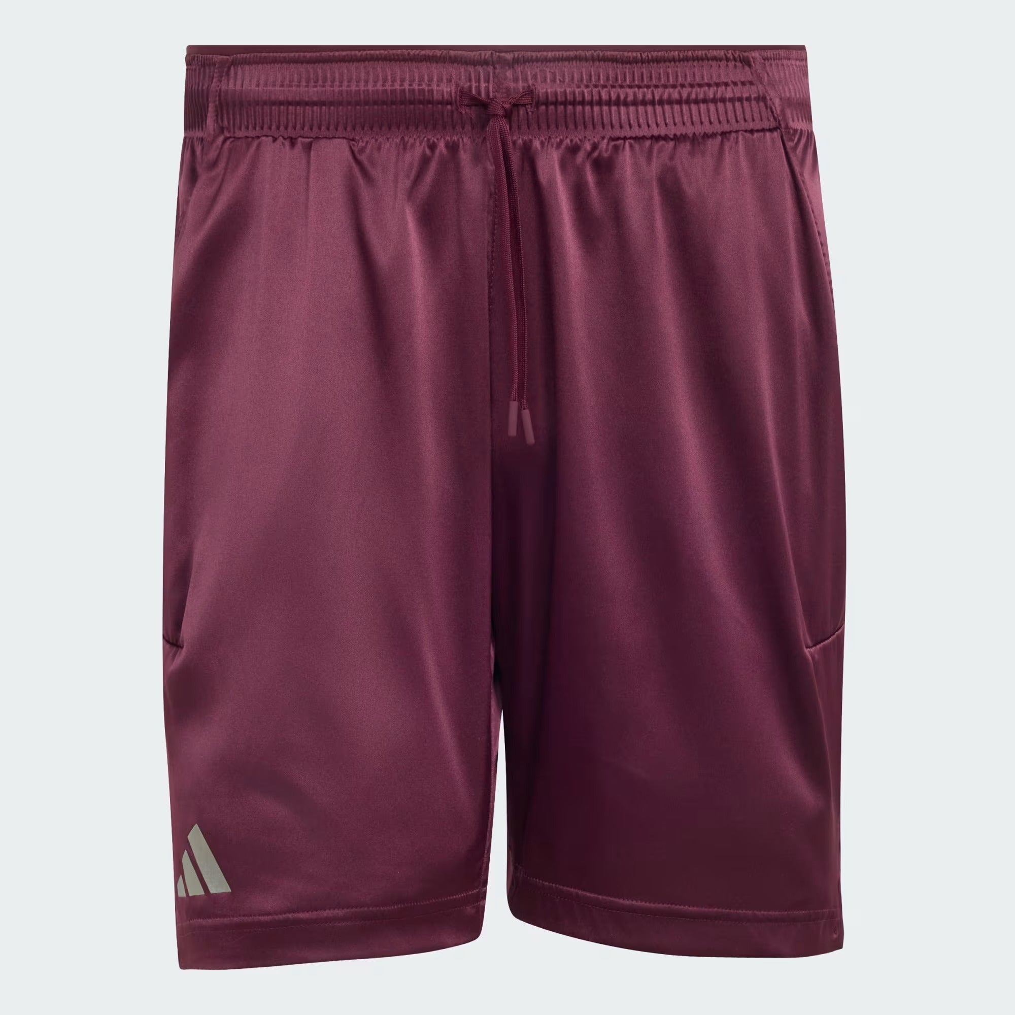 The ADIDAS Climacool Ergo Pro Men’s Badminton Shorts in maroon feature side pockets, an elastic waistband with a drawstring, and a small adidas logo on the front left leg. Engineered for comfort and performance during intense matches, these athletic shorts offer an ergonomic fit ideal for serious badminton players.