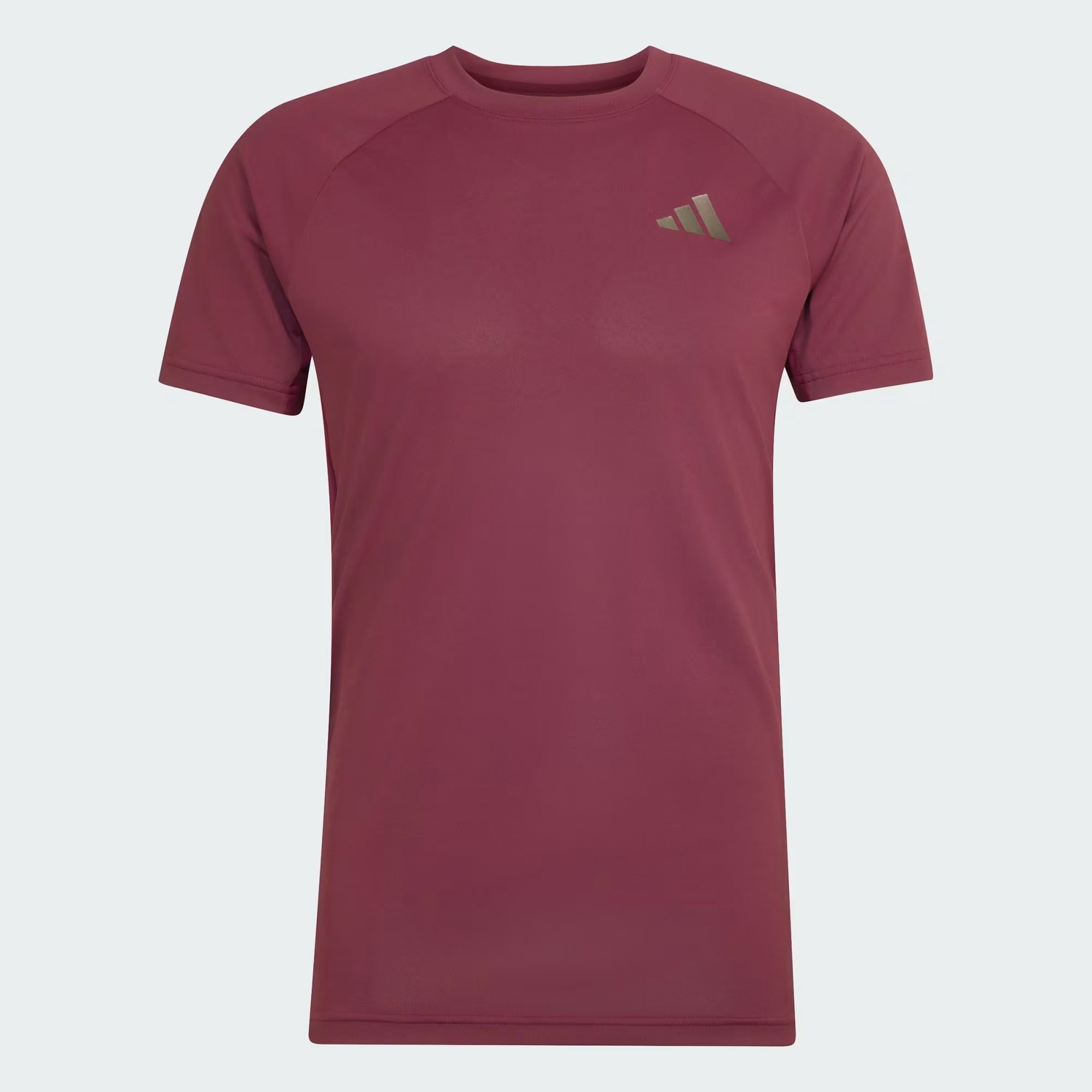 The ADIDAS Climacool+ Freelift Pro Men’s Badminton T-Shirt in maroon features short sleeves, a minimalist light-colored adidas logo on the left chest, and advanced Climacool+ technology for superior breathability—ideal for badminton. Displayed on a white background.