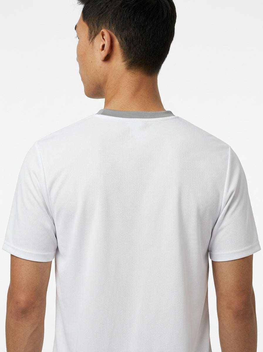 A man is shown from the back wearing the HEAD Simple Men's Badminton T-Shirt in white, featuring a gray collar and short sleeves, by HEAD. He stands against a plain white background.
