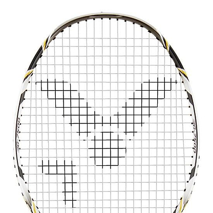 Close-up of the Victor G-7500 Badminton Racket - Black, focused on the head featuring a black logo design on Ashaway Rally 21 Fire strings. The frame is predominantly white with black and yellow highlights, making it an ideal full carbon beginner racket.