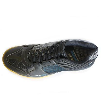 A top view of the Karakal Super Pro Indoor Court Badminton Shoes in black reveals a sleek honeycomb pattern on the upper, complemented by a gum-colored sole and blue accents. The design is enhanced by an asymmetric lace system, adding flair to these stylish shoes. The brand name "Karakal" is visible on the inside lining, evoking the essence of premium indoor court footwear.