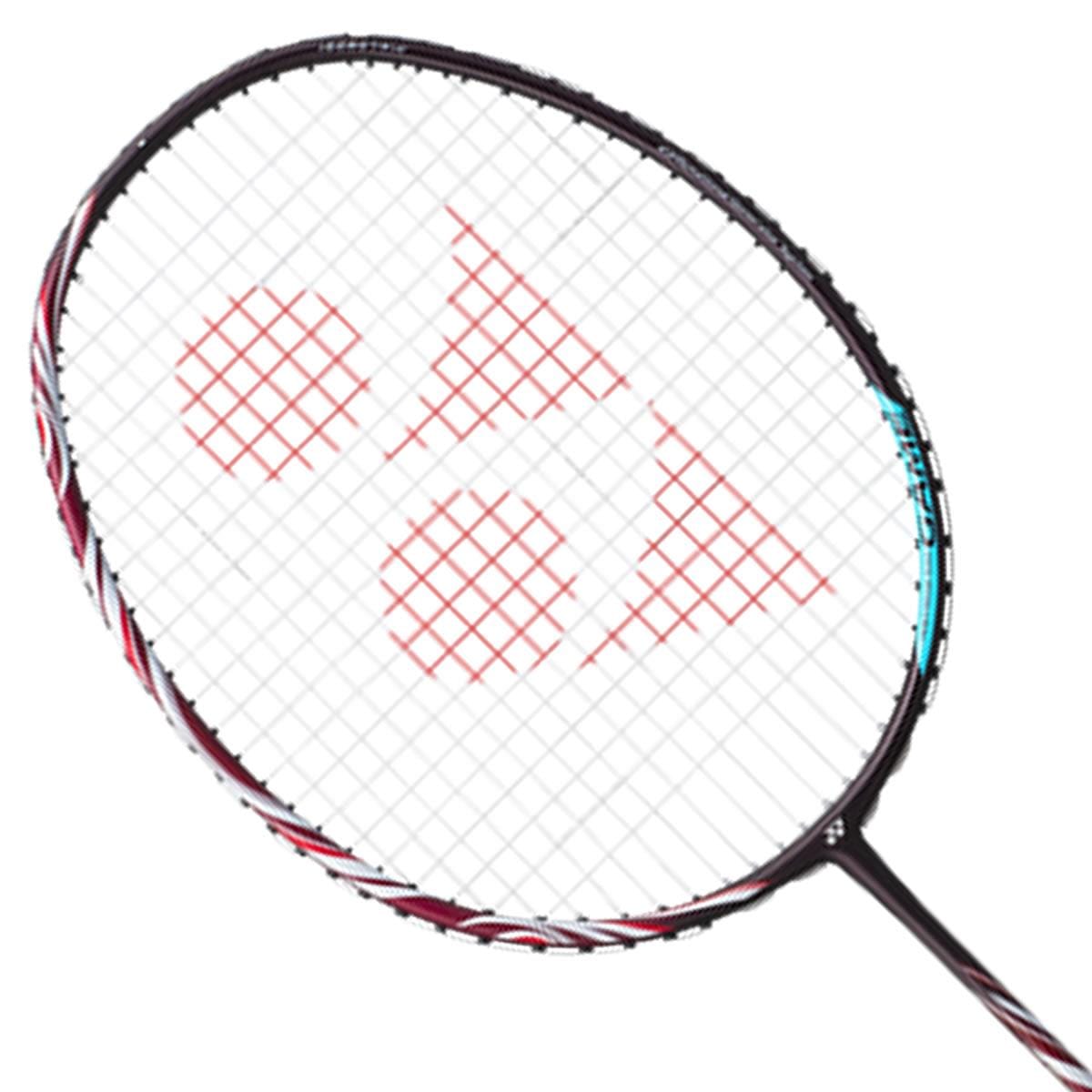 A close-up of a Yonex Astrox 100 Game 3U Kurenai badminton racket by Yonex highlights its striking black frame complemented by a red string pattern, emphasizing its head-heavy design ideal for powerful, steep attacks against a white background.
