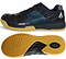 Karakal's Super Pro Indoor Court Badminton Shoes in black feature a blue accent with a side decorated in a honeycomb pattern and a gum-colored sole. From the top, an asymmetric lace system is visible, accompanied by "SUPER/PRO" text. These shoes for indoor courts also boast a unique heel design within their circular tread pattern.