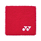 The Yonex AC493 Wristband - Red features a textured fabric surface and a small white geometric logo in the bottom right corner, designed to keep you cool and dry.