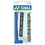 The Yonex AC139EX Twin Wave Grap Badminton Overgrip boasts a stylish white appearance with black print. It is tastefully packaged in a clear plastic case, showcasing the Yonex logo and detailed feature text prominently.