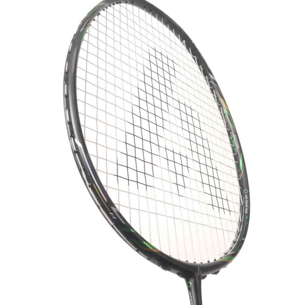 Close-up view of an Ashaway Phantom X-Shadow Badminton Racket in Black Green, highlighting its extra slim profile and unique white string pattern, angled slightly to the right against a white background.