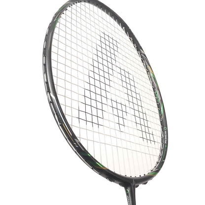Close-up view of an Ashaway Phantom X-Shadow Badminton Racket in Black Green, highlighting its extra slim profile and unique white string pattern, angled slightly to the right against a white background.