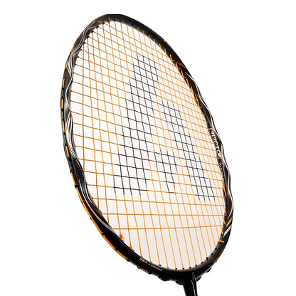 A close-up view of the Ashaway Phantom Helix Badminton Racket - Black Gold, showcasing its sleek cosmetic weave design with a black and gold frame. Positioned diagonally against a white background, it accentuates the string pattern and innovative Phantom Airflow System by Ashaway.