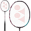 The Yonex Astrox 100 ZZ Kurenai Badminton Racket in Crimson Red showcases an ISOMETRIC frame and a Hyper Slim Shaft. It features a black frame and handle, along with a red and white string pattern creating a geometric design, all enhanced by a sleek black grip.