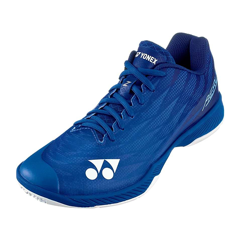 The Yonex Power Cushion Aerus Z2 Mens Badminton Shoes in navy blue feature a sleek, athletic design with a textured upper and white logo. Enhanced with Power Cushion technology, they offer comfort with a cushioned sole and lace-up closure, making them ideal for both Yonex enthusiasts and casual wear.