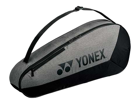 The Yonex 42523EX Team 3 Racket Badminton Bag in grey/black boasts a lightweight design, shoulder strap, and quality YKK zippers, with the Yonex logo prominently displayed.