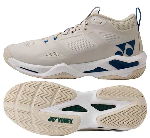 A pair of Yonex Power Cushion GRPHT THRTTL Concept men's badminton shoes in beige with blue accents and logo, featuring a breathable mesh upper, high-traction rubber sole with graphite throttle, and mid-top design; one side and one sole view shown.