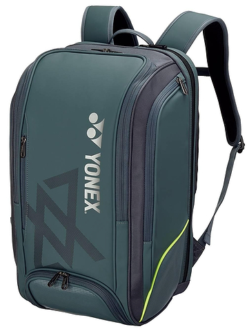 The Yonex 02512 Viktor Axelsen VA Expert Badminton Backpack in steel grey features multiple zippered compartments, side pockets, padded shoulder straps, and the Yonex logo. Perfect as a tournament badminton bag.