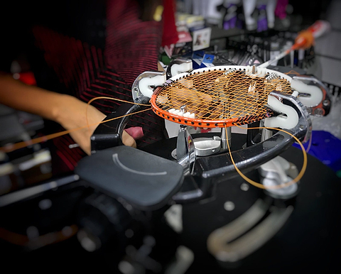 Badminton Racket Being Strung