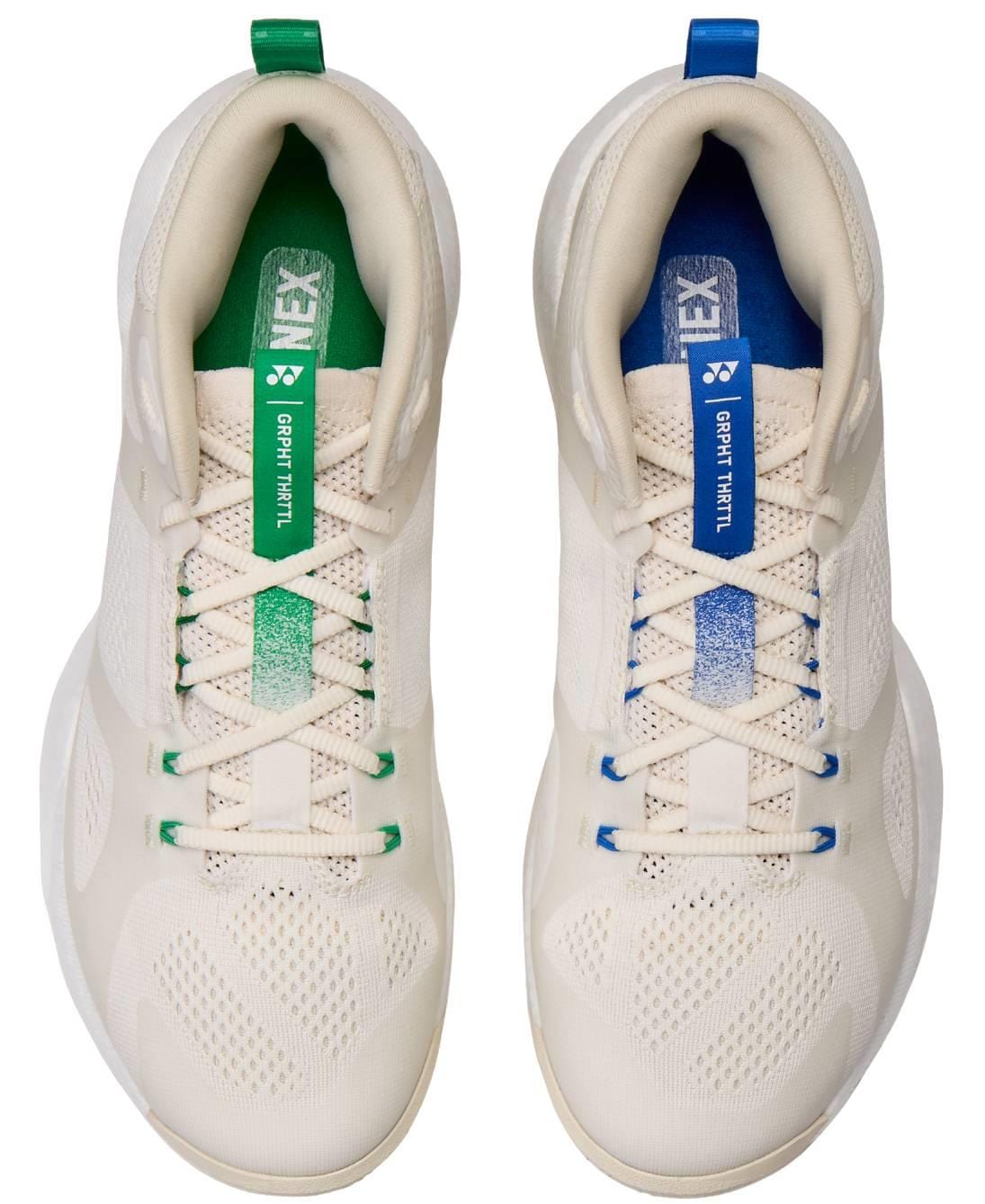 A pair of Yonex Power Cushion GRPHT THRTTL Concept men's badminton shoes in white, seen from above, with green and blue accents, gradient lace tags, matching pull tabs, and the superior comfort of Yonex Power Cushion.