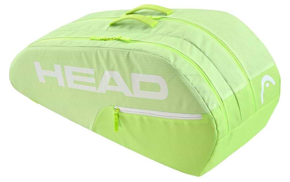 The HEAD BASE 6 Racket Badminton Bag M - SG in lime green features three compartments, a top handle, and showcases "HEAD" in bold white letters. It includes a side zippered pocket for extra storage, perfect for all your tennis essentials.