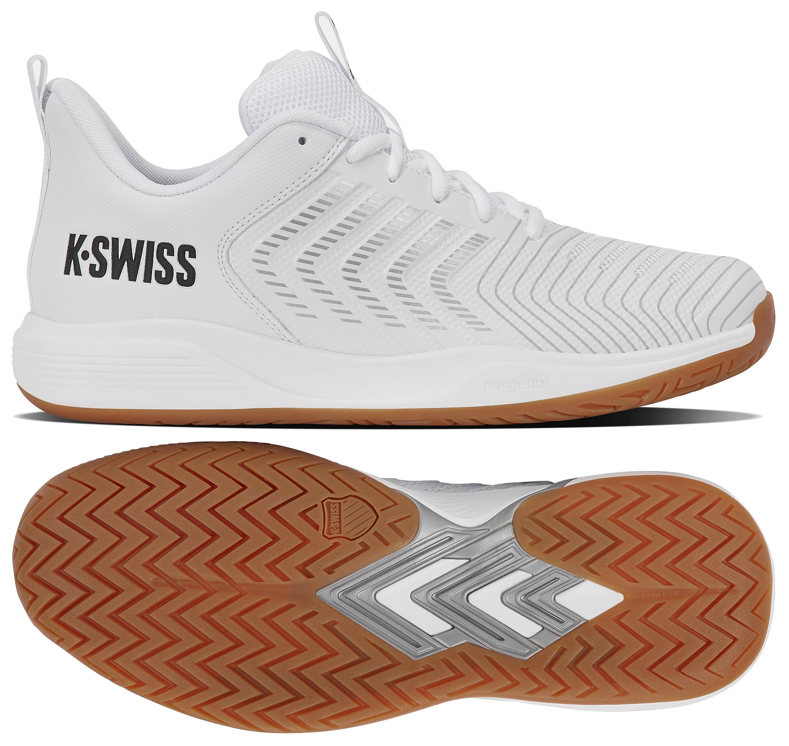 The K-Swiss Ultrashot Light Indoor Men's Badminton Shoe in White/Black/Silver features a side and bottom view, showcasing its textured design, "K-SWISS" black branding, and brown non-marking gum rubber outsole with a herringbone tread pattern—specifically engineered for indoor badminton play.