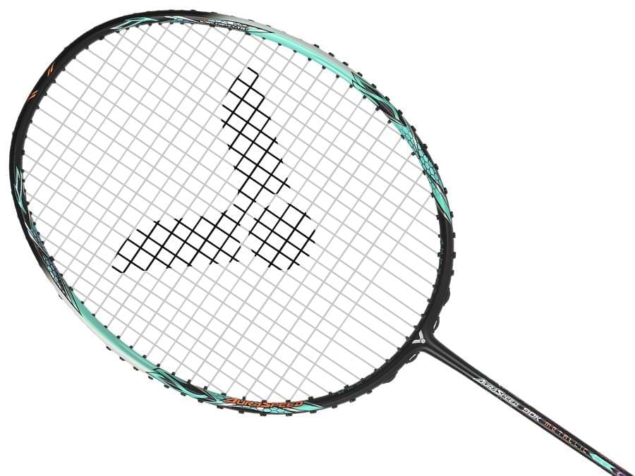 A close-up of the Victor Auraspeed 90K Metallic 4U badminton racket from Victor highlights its black frame paired with a light blue and black handle for superb shock absorption. The meticulously arranged strings form a precise grid, while the center of the string bed features a black logo set against a white background.