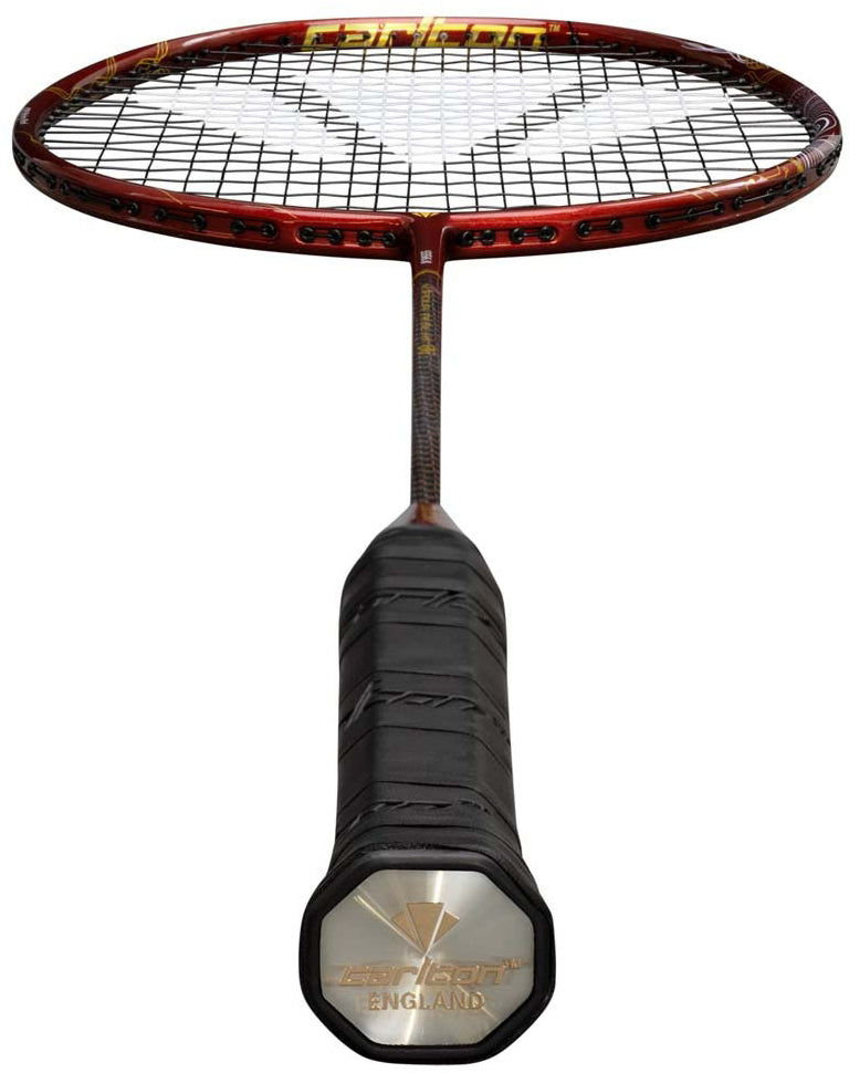 A close-up of the Carlton Vapour Trail HT 86 G6 3U Badminton Racket in red showcases the grip with the Carlton brand logo and strings above, photographed from the handle toward the head to emphasize its head-heavy balance.